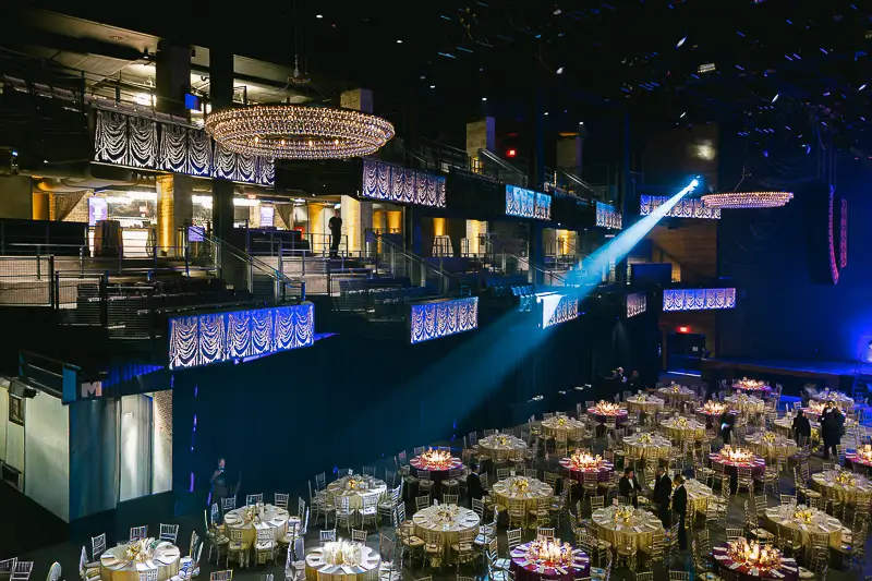 Large-scale corporate gala setup in Washington DC, photographed to document venue size, lighting complexity, and event production scope