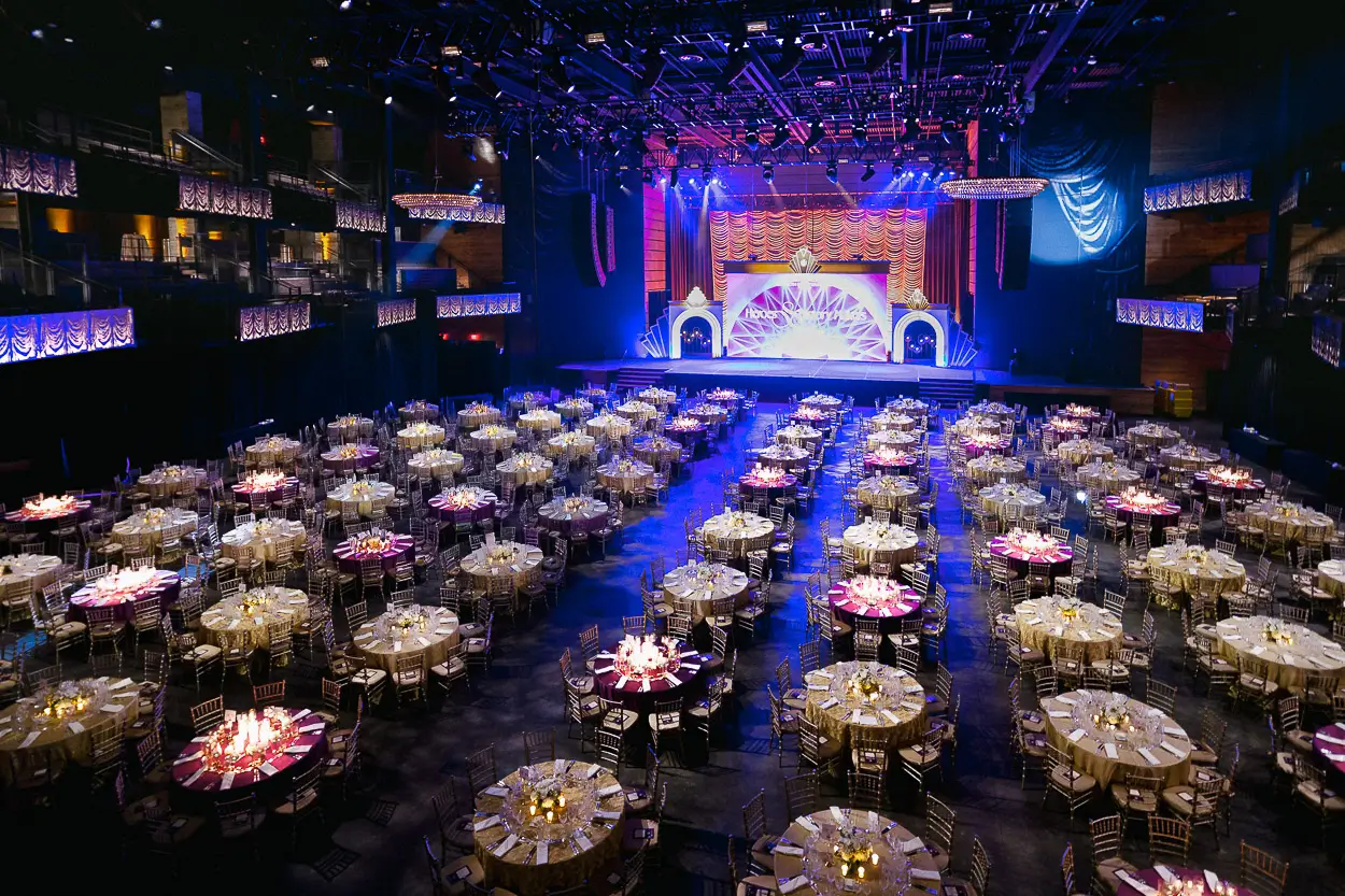 Corporate gala venue setup in Washington DC with tables, stage design, and lighting prepared for an evening program
