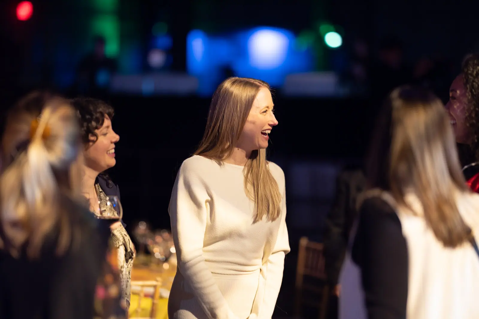 Candid attendee interaction during a professional conference in Washington DC