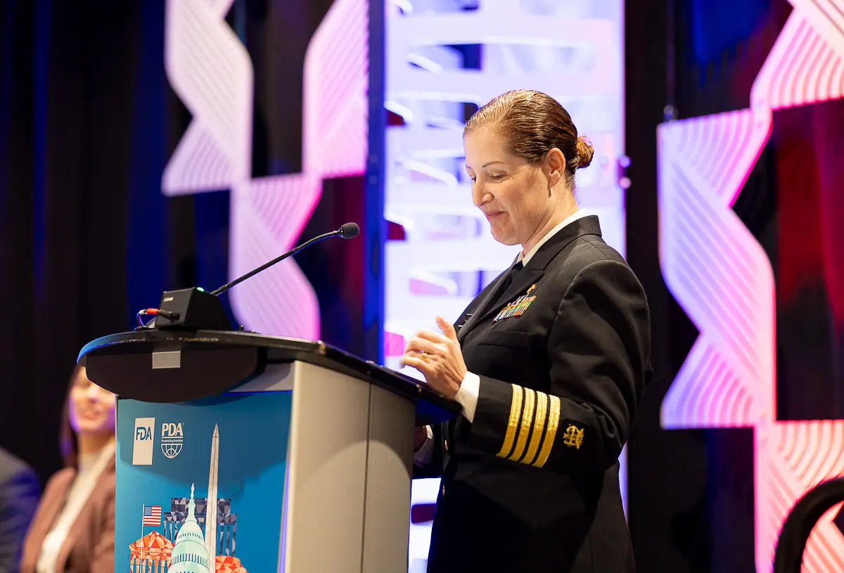 Military and FDA speaker photographed during a Washington DC government event in a hotel ballroom