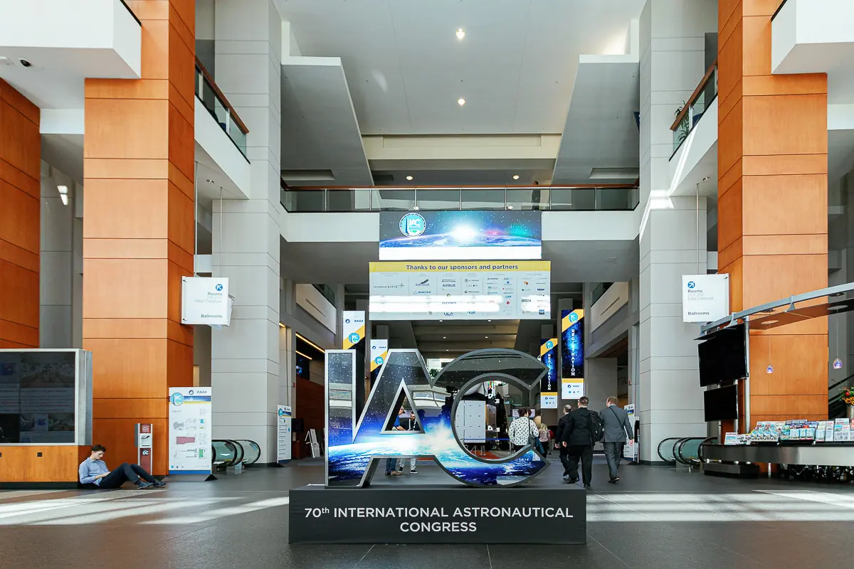 Aerospace association conference attendees and exhibit space photographed during a Washington DC policy event