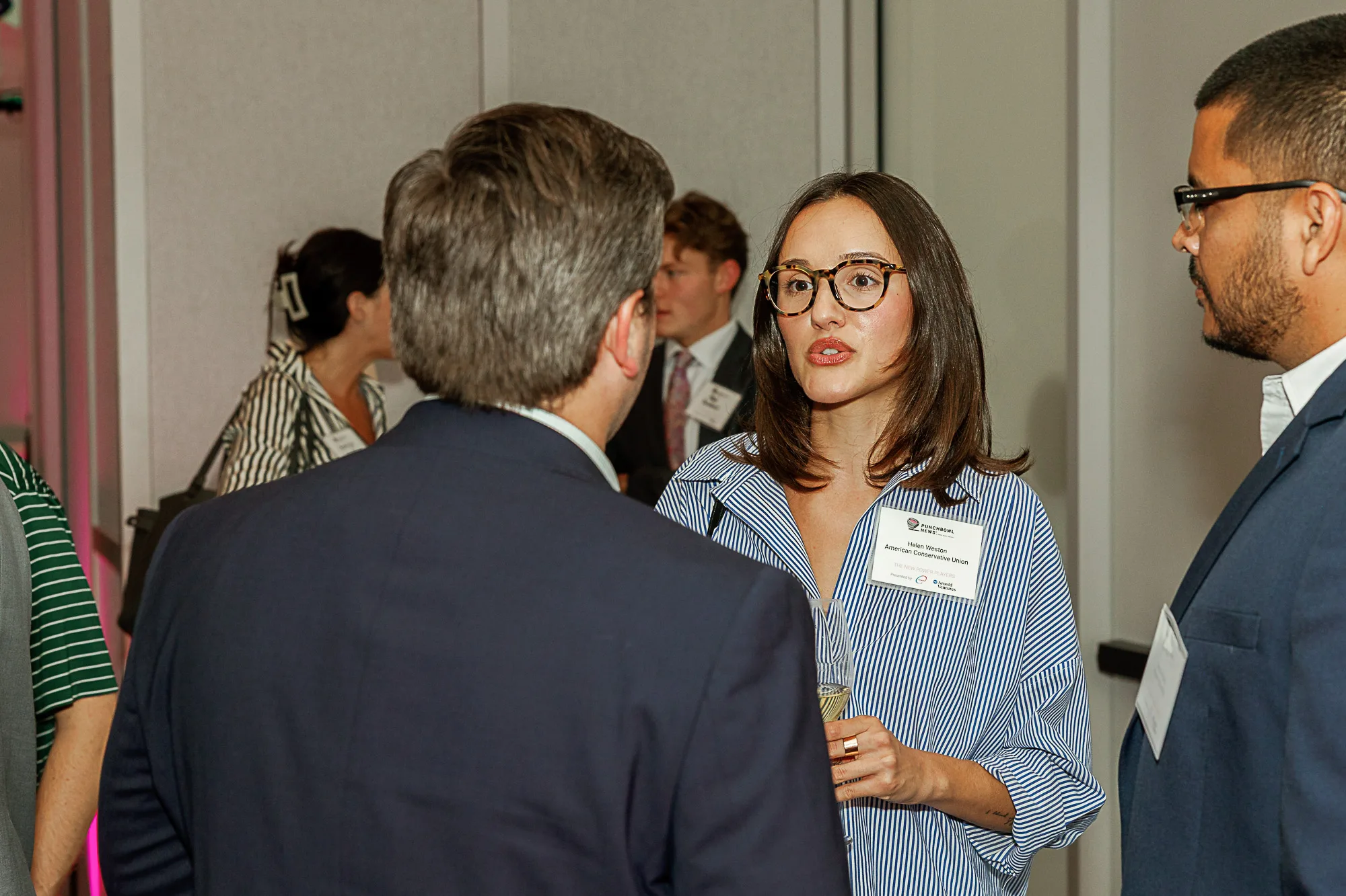 Attendees networking at Punchbowl News press conference Washington DC