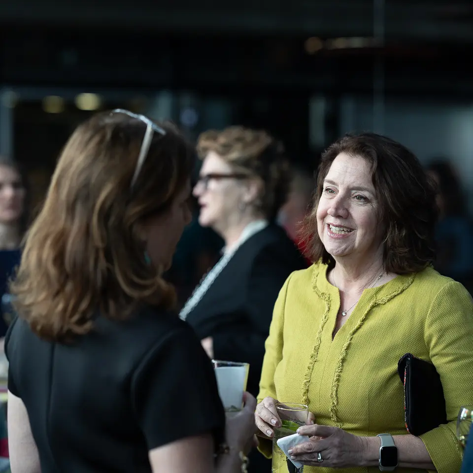FDA-PDA Annual Conference attendees in conversation during a networking reception