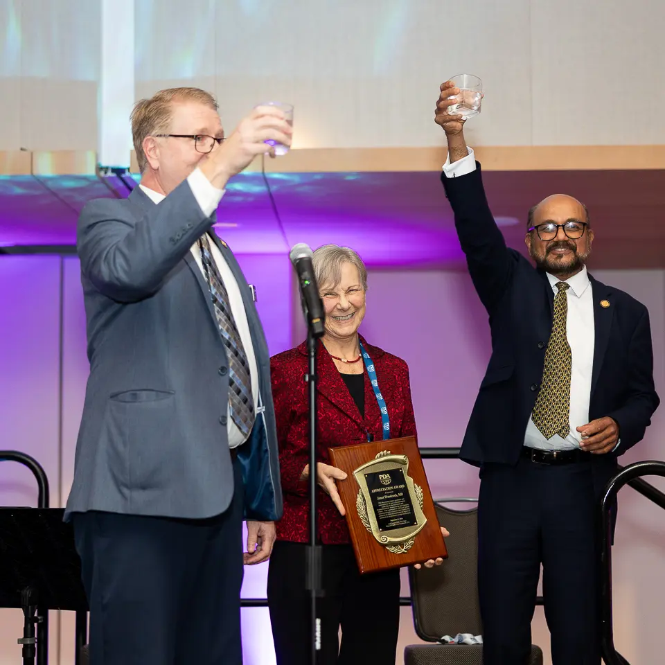 Award recognition moment on stage during the FDA-PDA Annual Conference