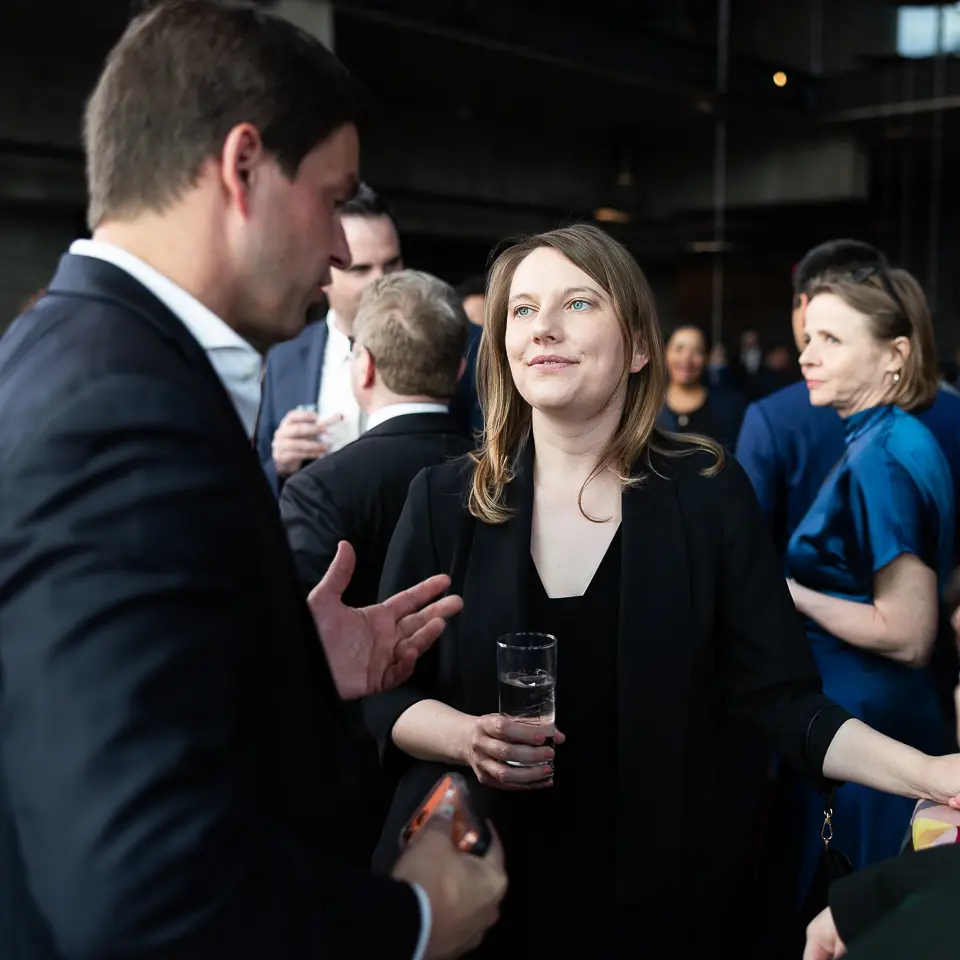 Networking conversation with drinks during the FDA-PDA Annual Conference reception