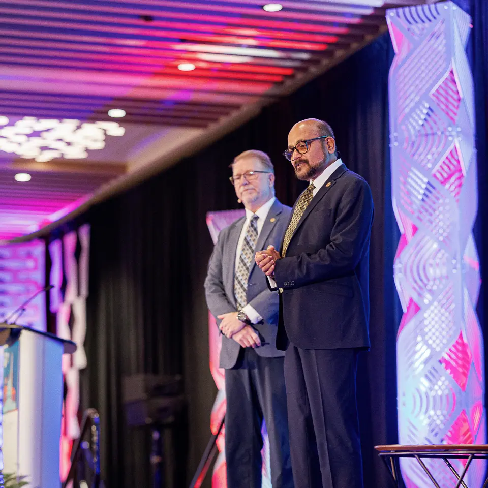 Speakers on stage delivering opening remarks at the FDA-PDA Annual Conference in Washington, DC