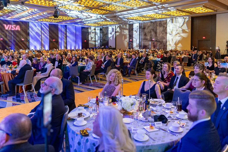 Wide banquet view of the Herb Wegner Awards 2026 ballroom filled with dinner guests.