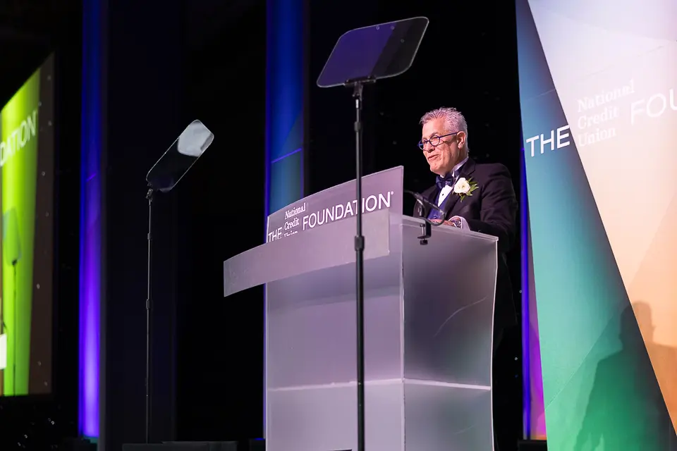 Male speaker at The Foundation podium during the Herb Wegner Awards 2026 gala.