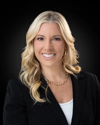 Executive business headshot of blonde professional photographed in Washington DC by District Pixel