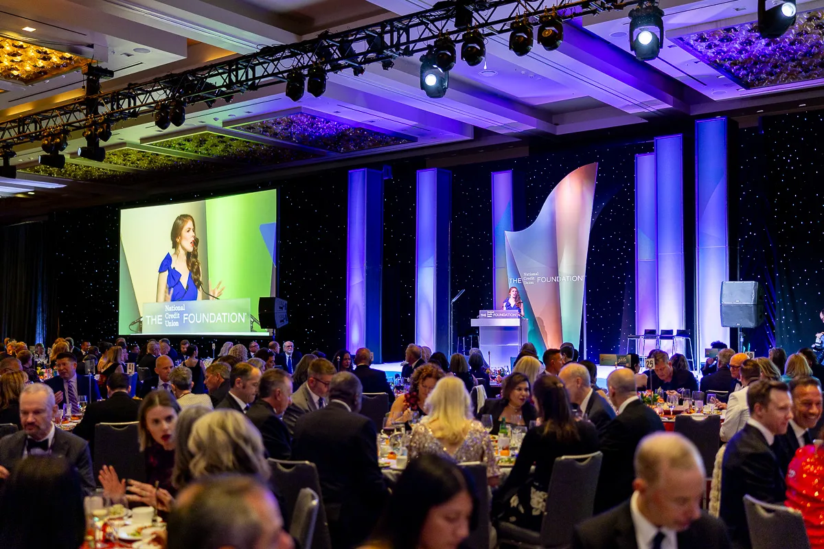 Award ceremony at a Washington DC hotel event, photographed with refined corporate event photography for speakers, staging, and audience moments.