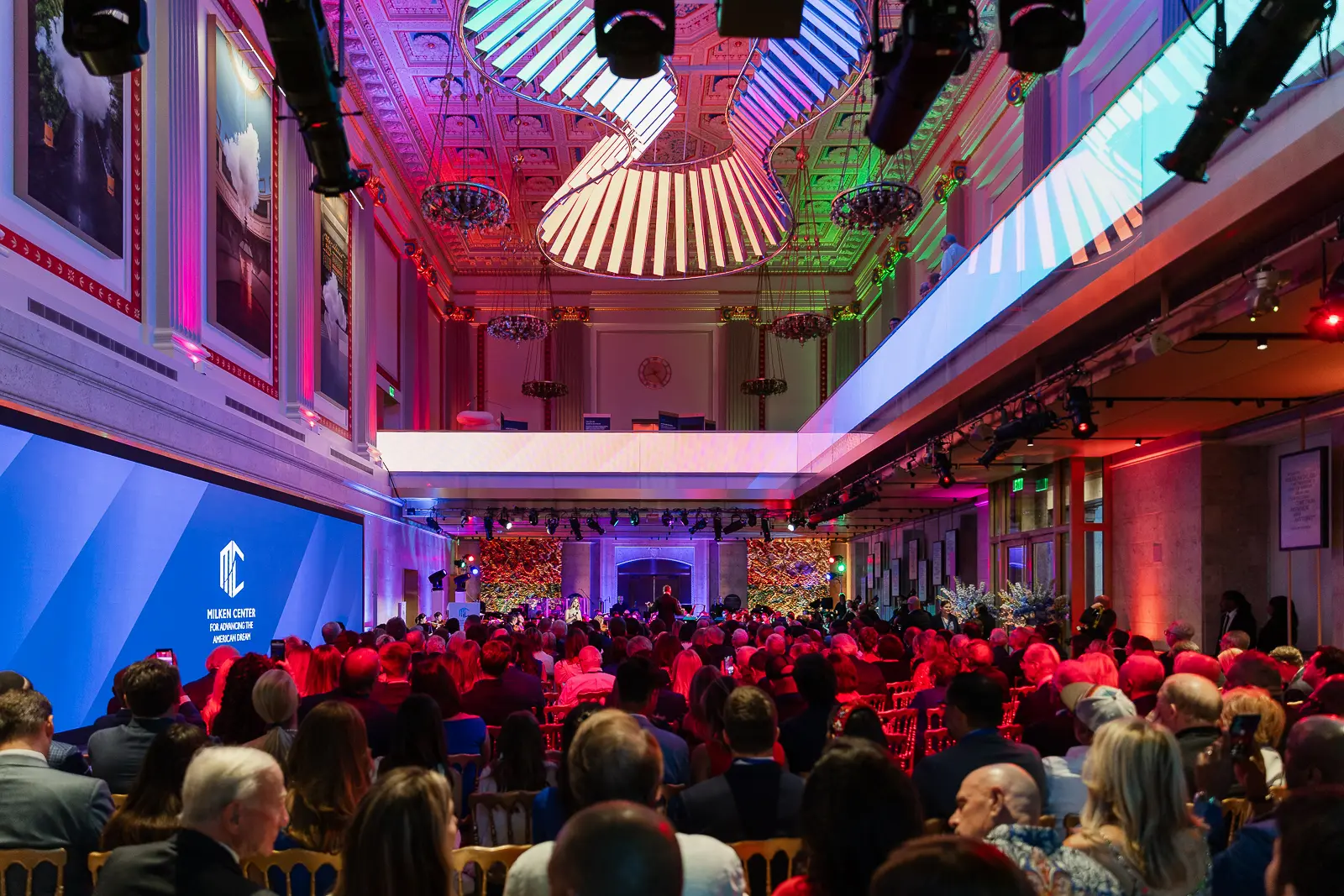 Corporate event photography in Washington DC showing an audience, stage lighting, and live production captured by District Pixel.