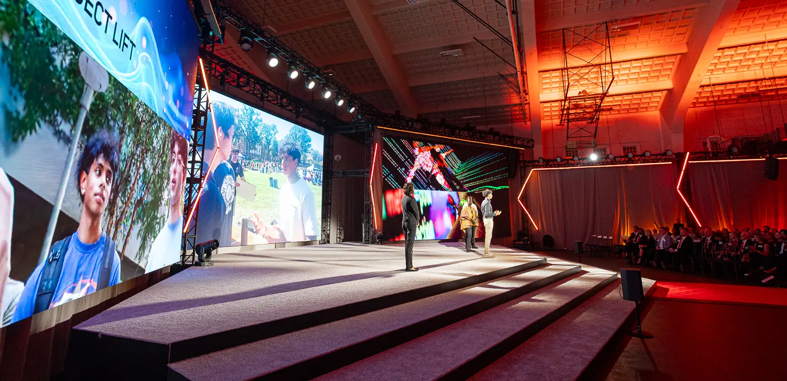 University of Maryland College Park fundraising event presentation with a large screen and corporate event photography coverage.