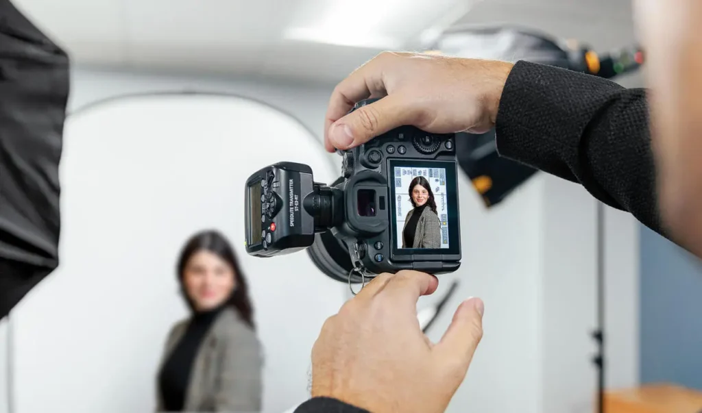 Behind-the-scenes corporate headshot photography session in Washington DC with professional studio lighting and camera setup