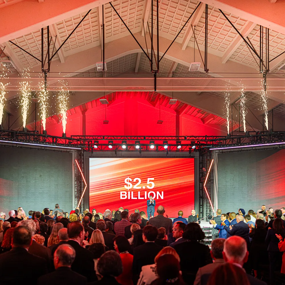 Fundraising gala stage and audience photographed during a Washington DC event