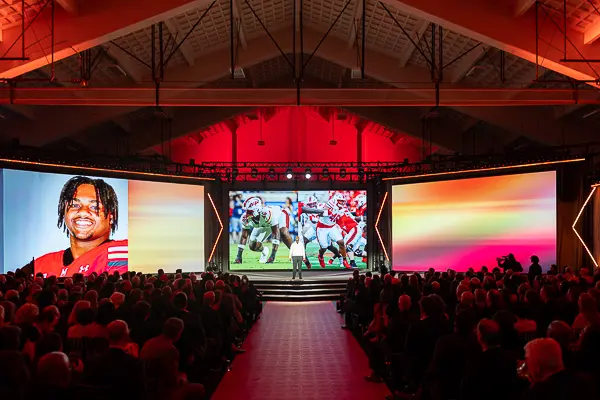 Washington DC conference photographer covering a speaker presentation with big screens at Union Station