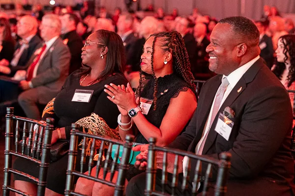 Washington DC conference photographer documenting audience reaction at a corporate gala
