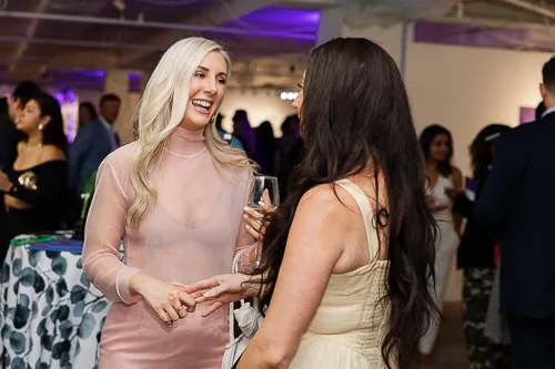 Washington DC event photographer capturing guests in conversation at a reception